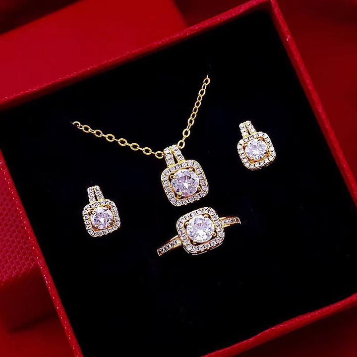 Gold zircon jewellery set – choker necklace, stud earrings and ring