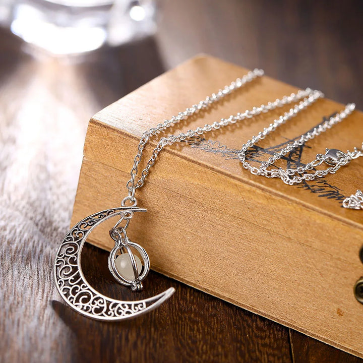 Crescent moon necklace with glow bead