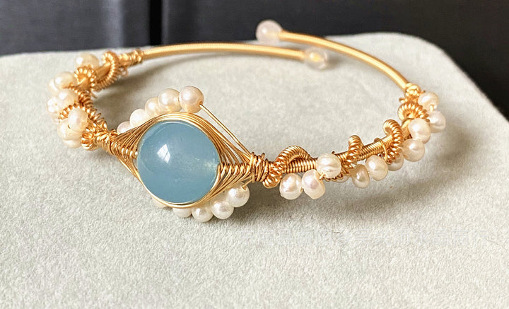 Gold wire cuff bracelet with pearls