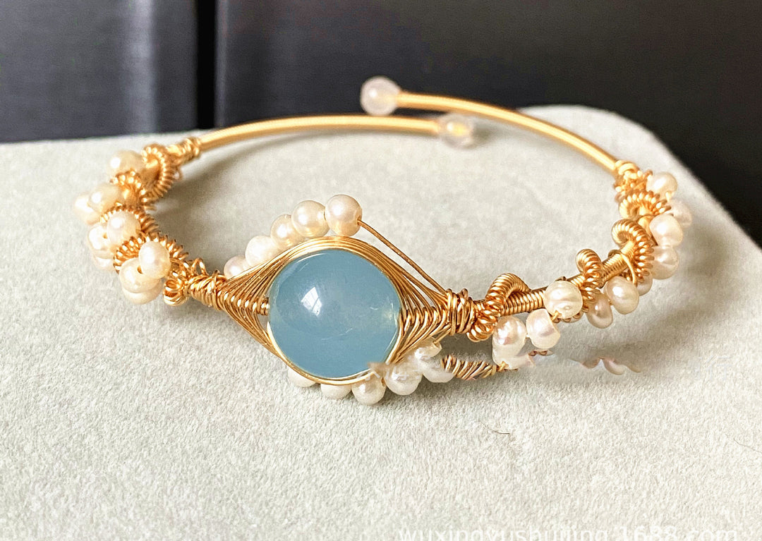 Gold wire cuff bracelet with pearls