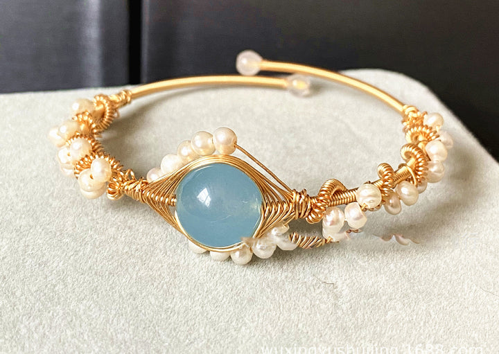 Gold wire cuff bracelet with pearls