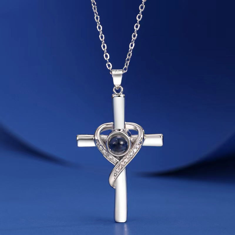 Cross and heart projection pendant