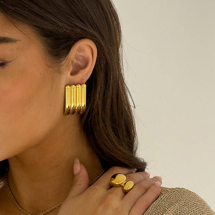 Artistic Gold Long Ribbed Earrings