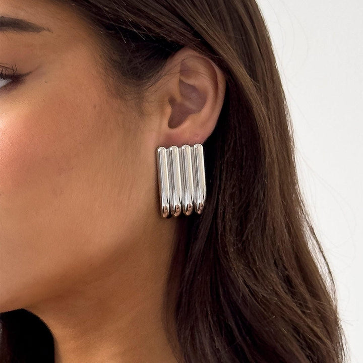 Artistic Silver Long Ribbed Earrings