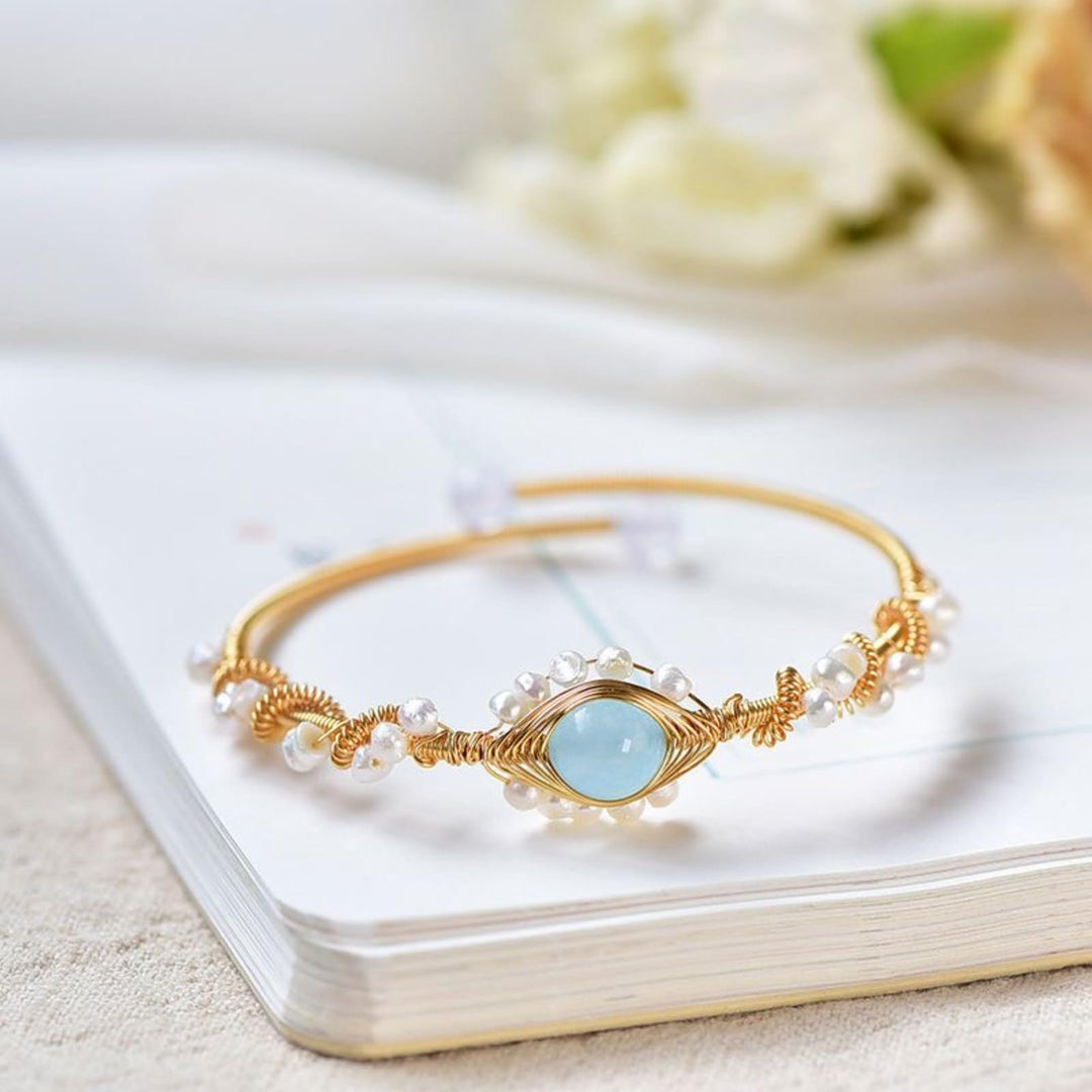 Gold wire cuff bracelet with pearls