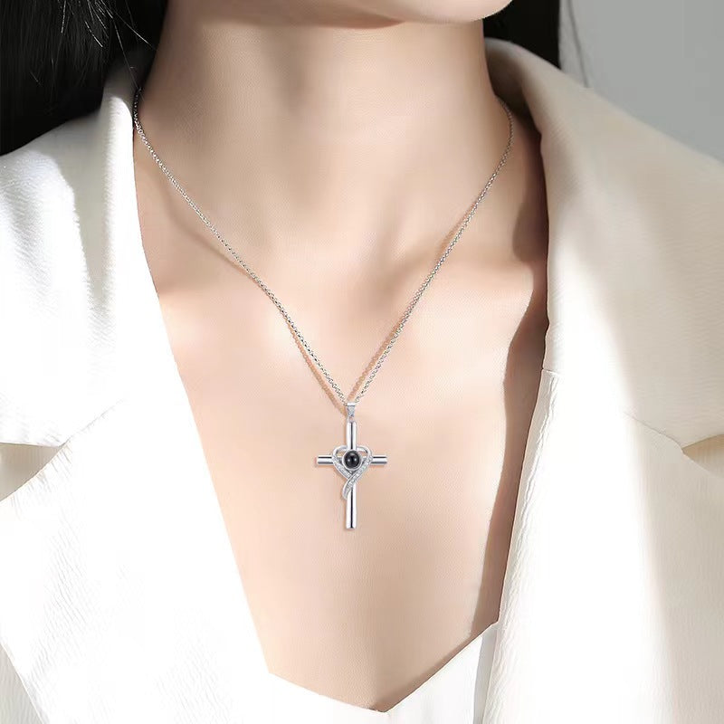 Cross and heart projection pendant