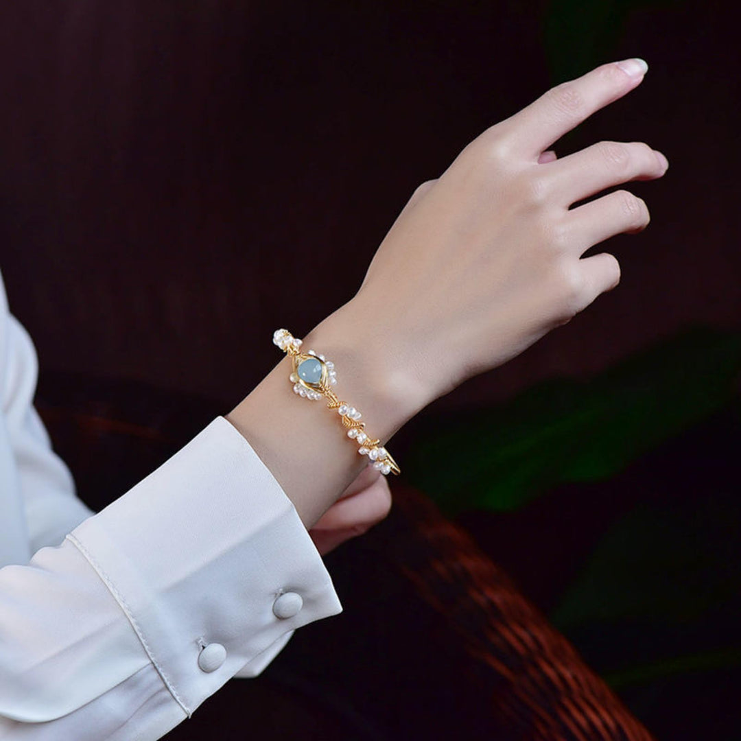 Gold wire cuff bracelet with pearls
