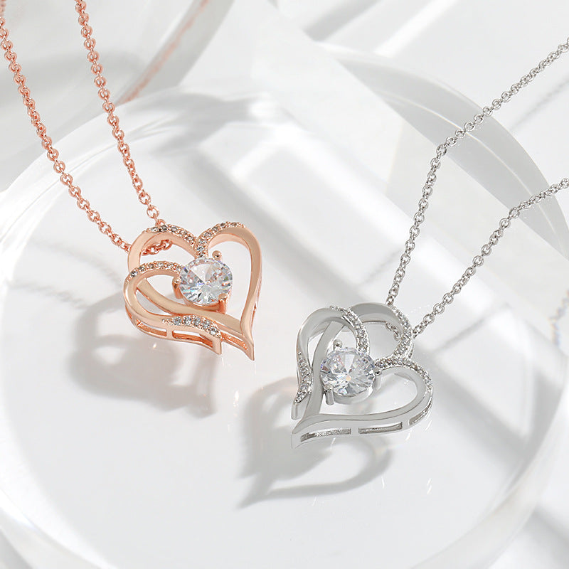 Double heart pendant with zircon
