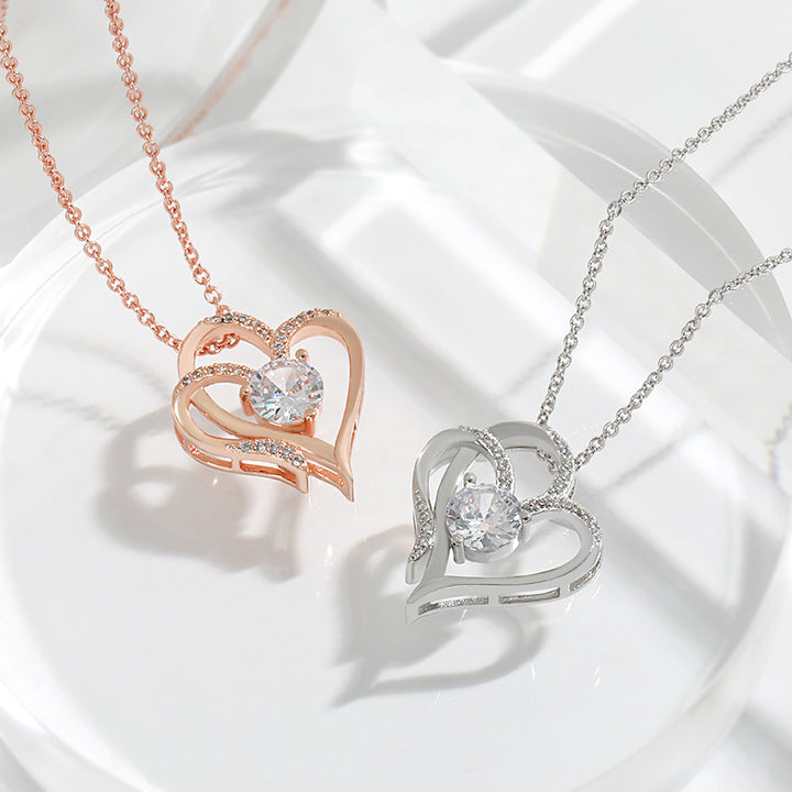 Double heart pendant with zircon