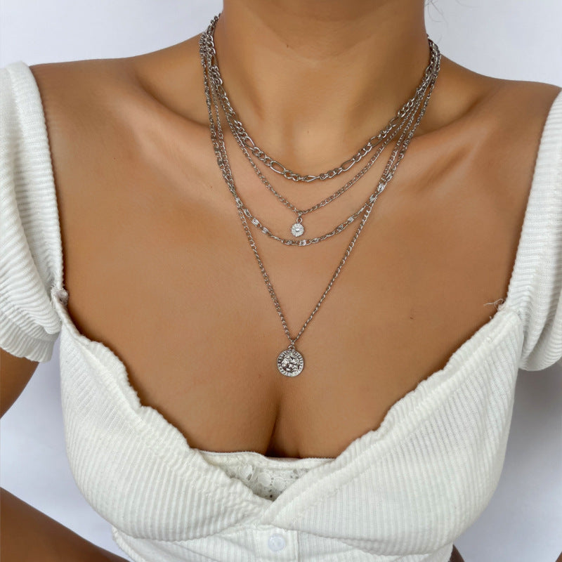 Layered gold coin chain necklace