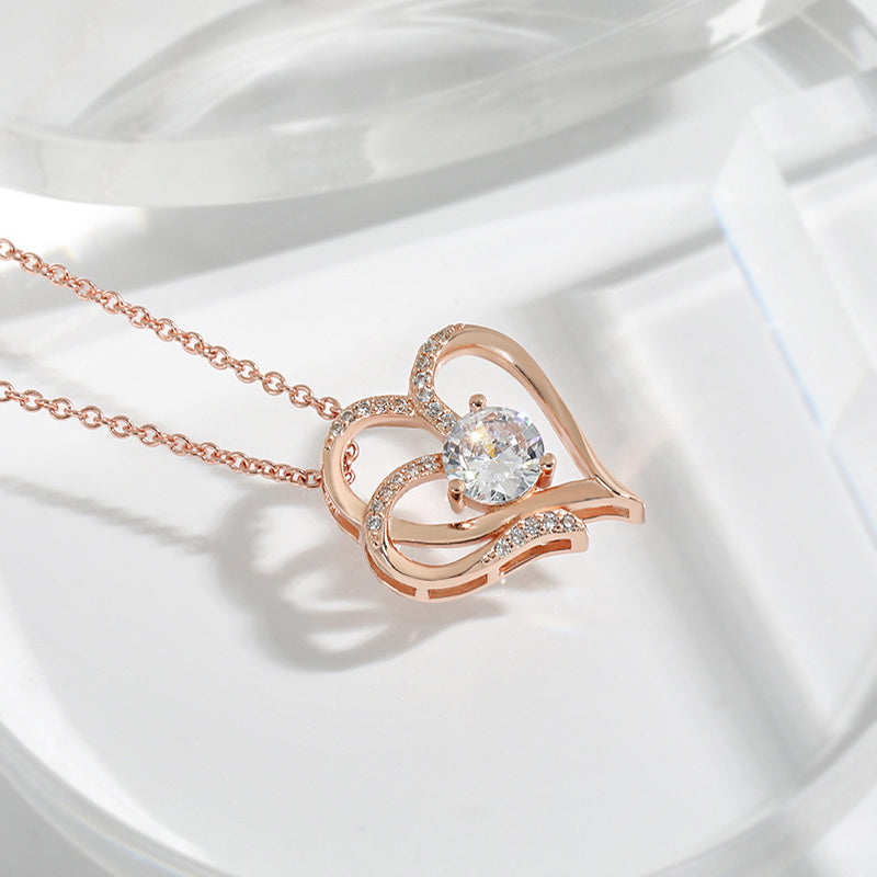 Double heart pendant with zircon