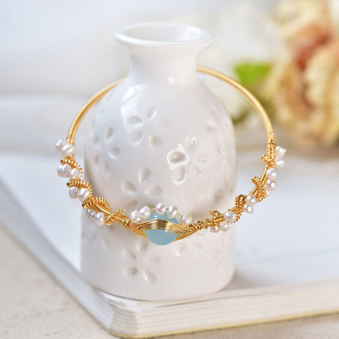 Gold wire cuff bracelet with pearls
