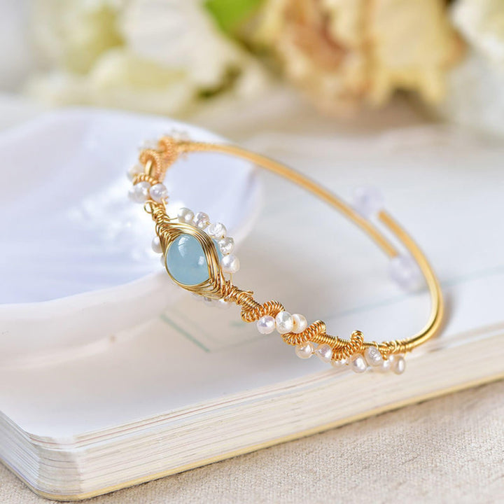 Gold wire cuff bracelet with pearls