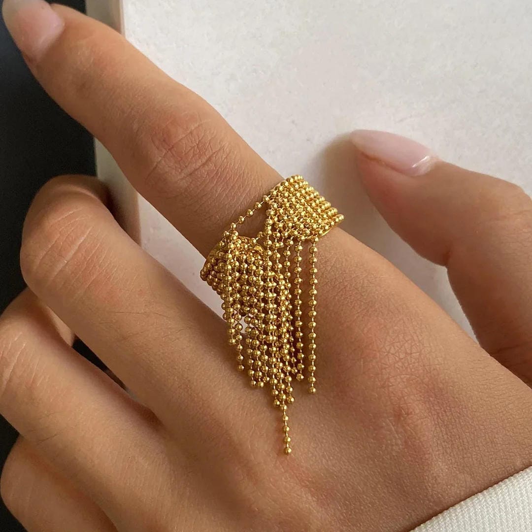 Radiant Gold Tassel Ring