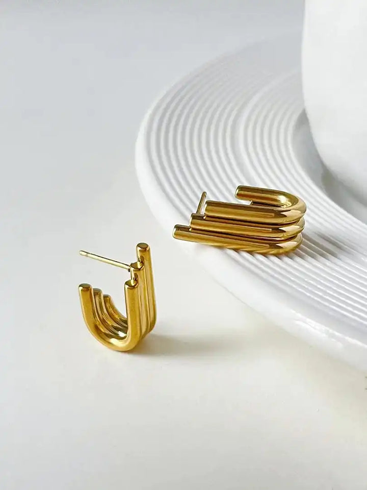 Lustrous Curved Ribbed Gold Earrings