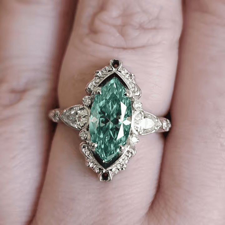 Emerald Marquise Halo Ring