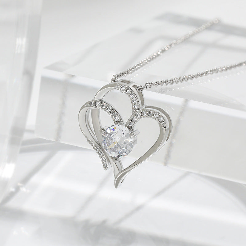 Double heart pendant with zircon