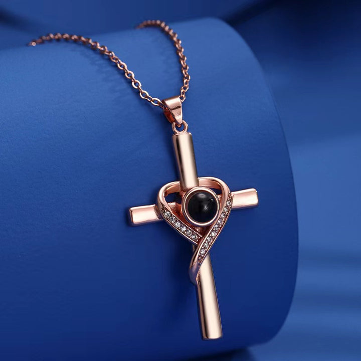 Cross and heart projection pendant