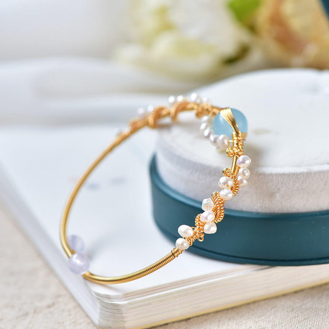 Gold wire cuff bracelet with pearls